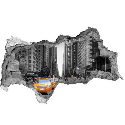 Adesivo con vista dietro il muro I taxi di New York nel paesaggio urbano