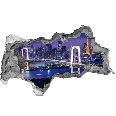 Sticker effetto rottura muro Il ponte illuminato dalla luce notturna