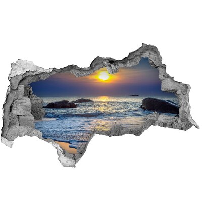Adesivo con vista dietro il muro Tramonto sul mare