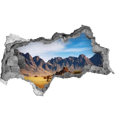 Adesivo con vista dietro il muro Paesaggio montano in Africa