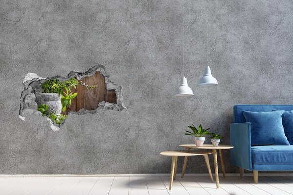 Sticker effetto rottura muro Un giardino verde in una cavità di cemento