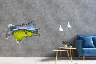 Sticker effetto rottura muro Colline verdi tra le nuvole