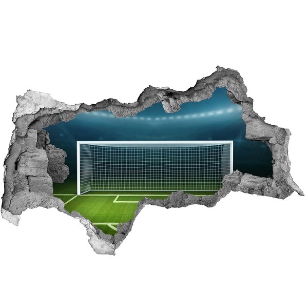 Adesivo con vista dietro il muro Lo stadio di calcio dietro il buco nel muro