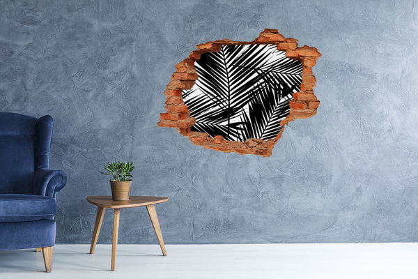 Adesivo murale buco 3D Foglie tropicali in un buco nel muro