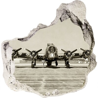 Finto buco nel muro 3D Un vecchio aereo sulla pista dell'aeroporto.